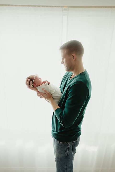 Father and newborn daughter