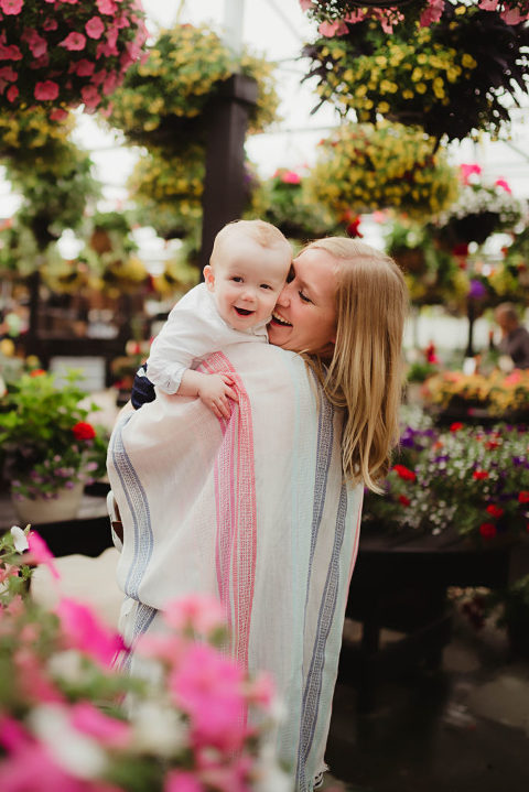 Mother and baby son laughing